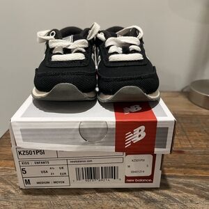 New Balance Kids' Black and White Sneakers